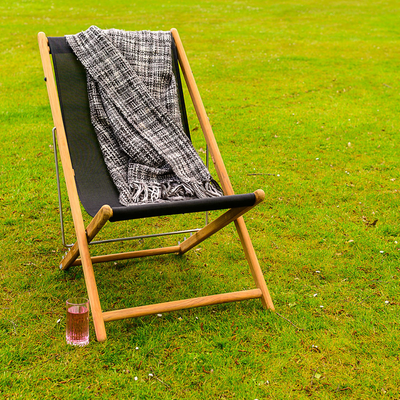 Product photograph of Sindos Traditional Teak Beach Deck Chair from Cotswold Teak